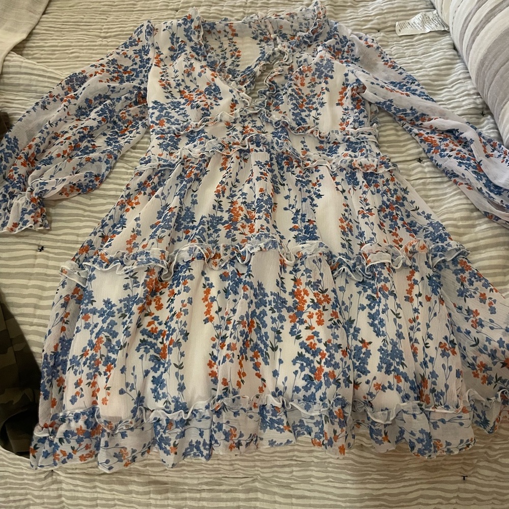 Open back and foley dress. Mid length